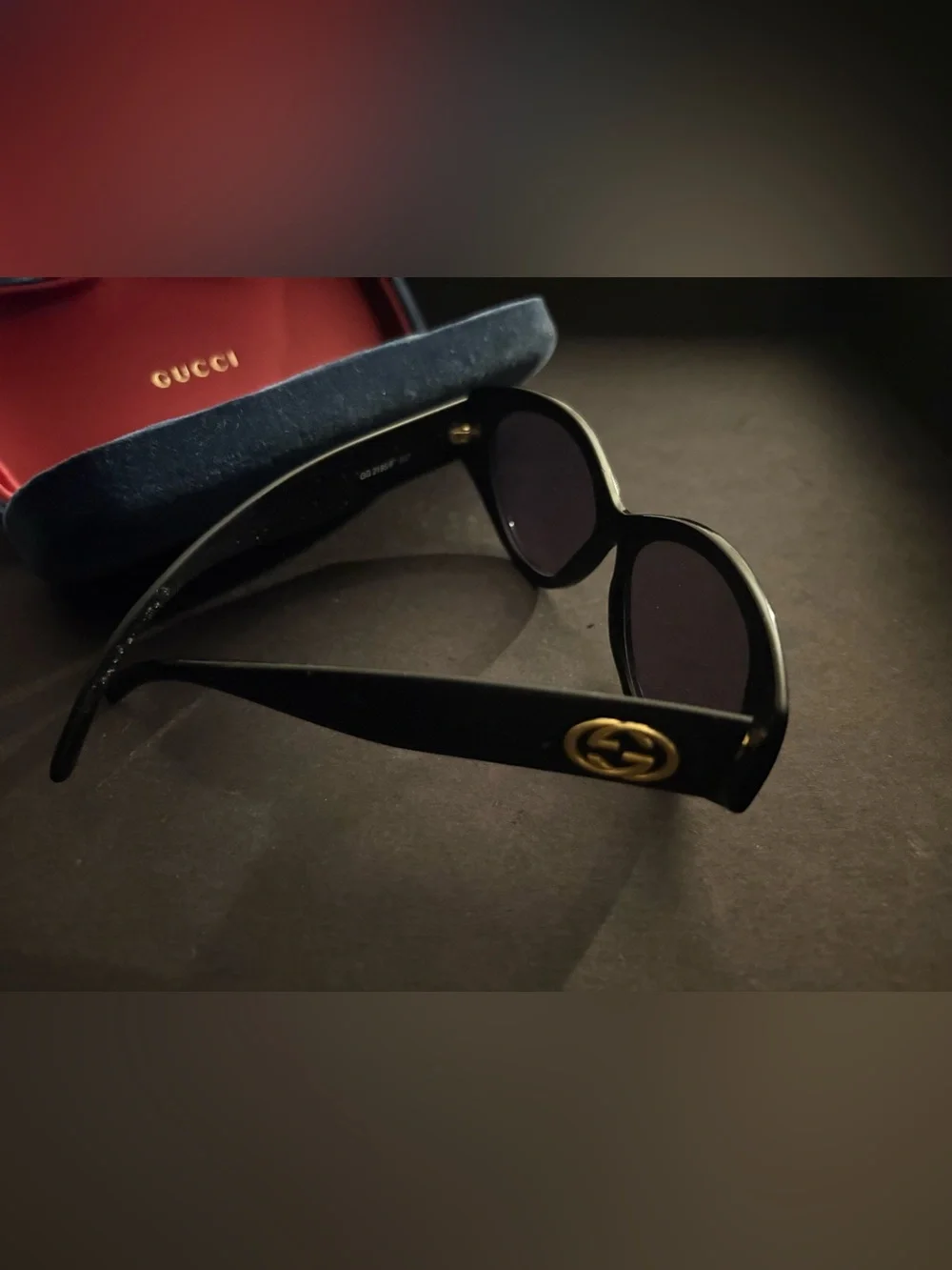 Gucci Black Cat-Eye Sunglasses with Pink Velvet Case and Blue Trim